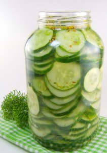glass gallon jar of sliced cucumber pickles