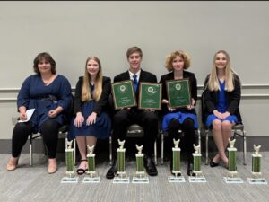 Team members with their awards