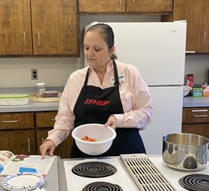 Chrissy making a recipe